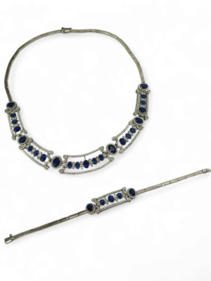 Srebrny, bardzo elegancki komplet z granatowymi i białymi cyrkoniami