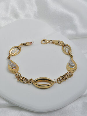 Złota, grubsza, elegancka bransoletka z cyrkoniami pr.585